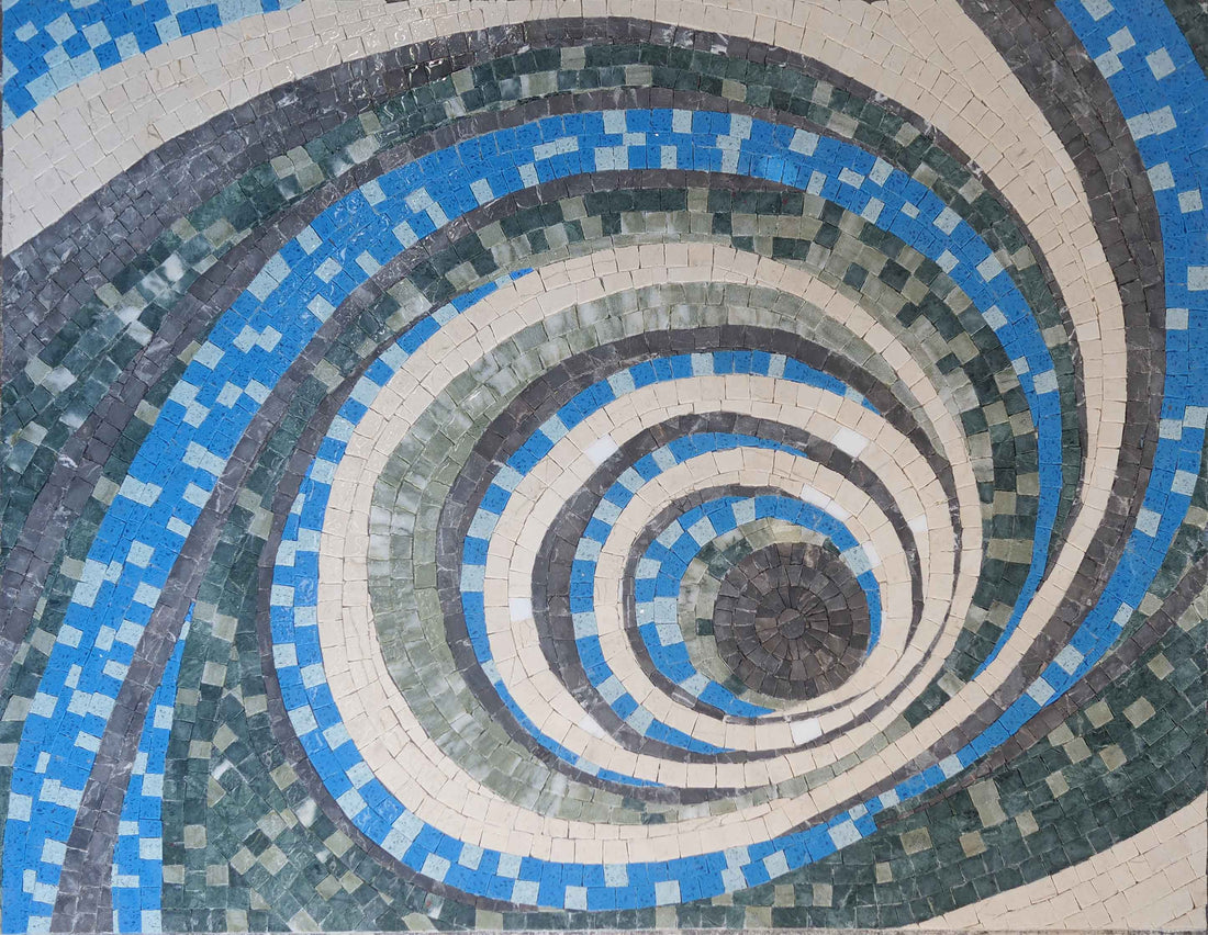 Spiral mosaic winding inward in blue, grey and cream tesserae