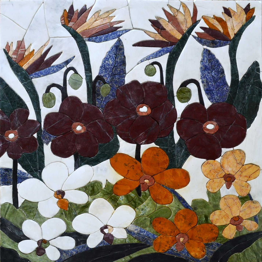 Floral mosaic of deep red poppies with orange and white blooms and blue-grey leaves on white marble