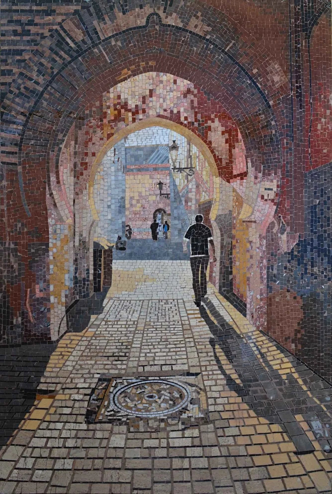 Mosaic of a brick archway over a cobbled street, with two figures walking into the light beyond