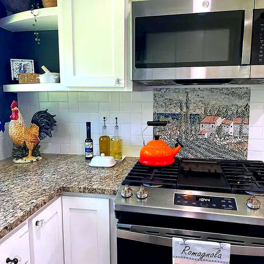 Luxurious kitchen adorned with an intricate, flowing mosaic art backsplash, highlighting refined design and craftsmanship.