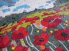 Obra de mosaico: tulipanes rojos y cielos azules