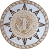 Bussola sabbiosa e medaglione a mosaico con ancora