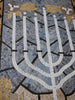El símbolo judío del mosaico de la menorá