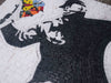 Art de la mosaïque - Lanceur de fleurs Banksy