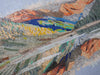 Art mural en mosaïque avec vue sur la montagne